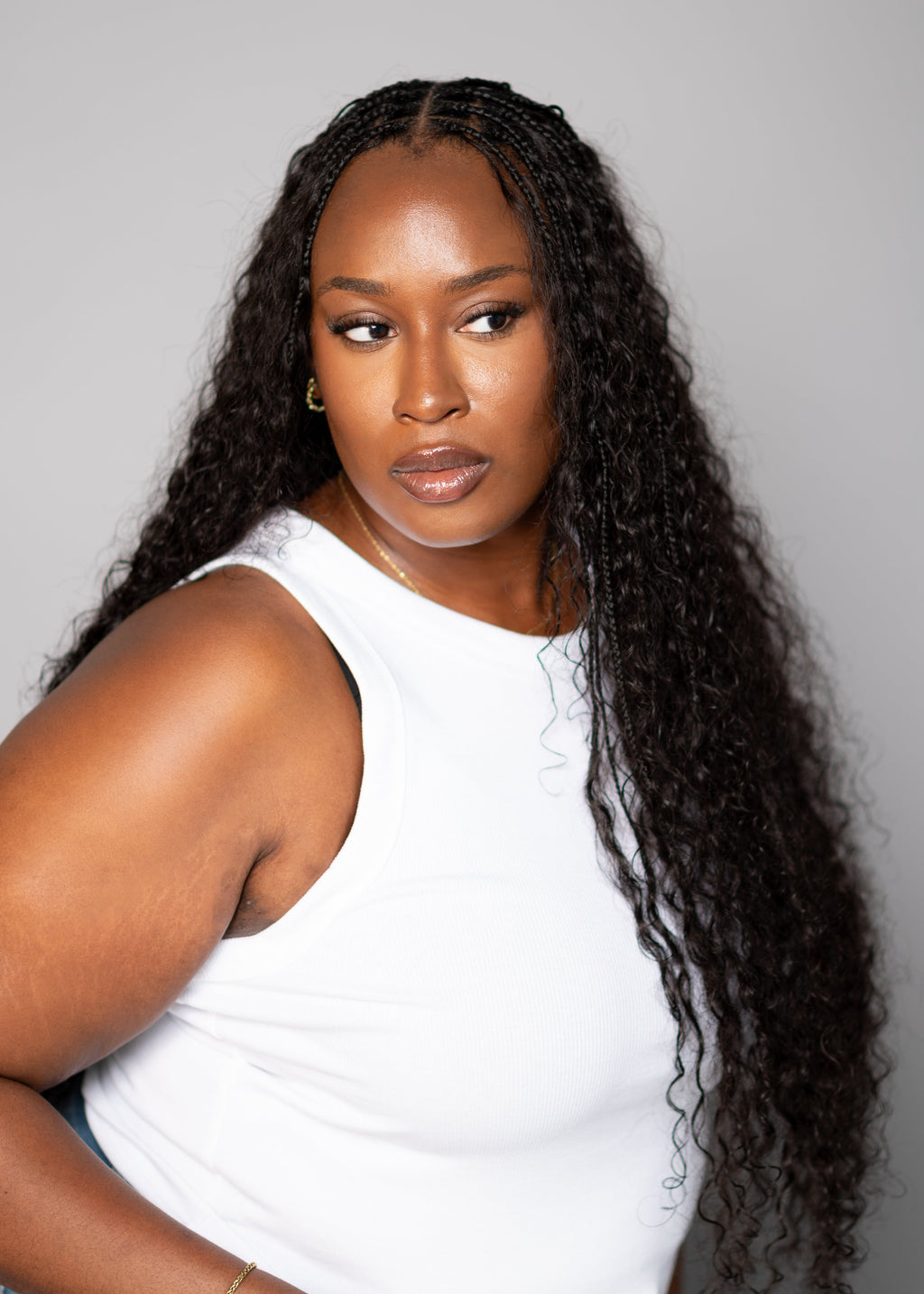 Woman with long, curly boho braids